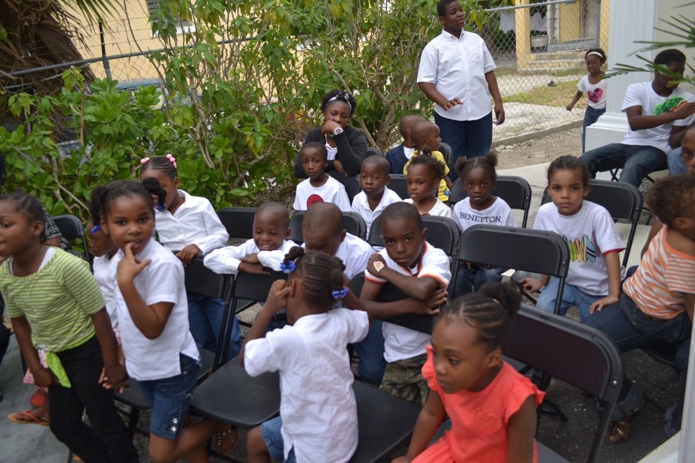Children gathered outdoors at Big Harvest Community Sunday School